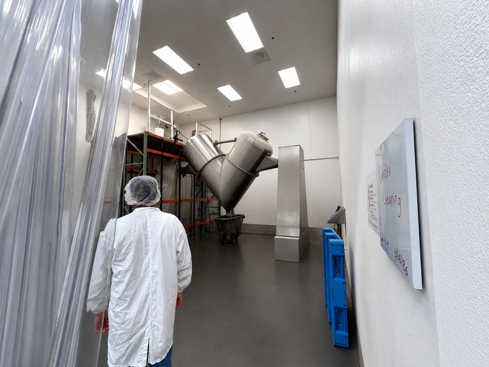 V-Rex industrial blender inside the Kelker Pharma manufacturing facility